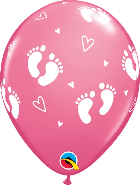 pink balloon with baby footprints and hearts