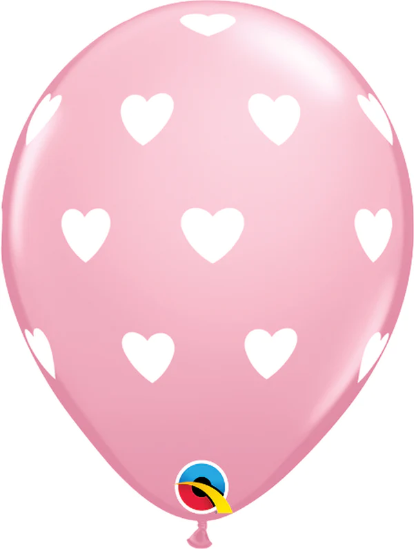 pink balloon with white hearts