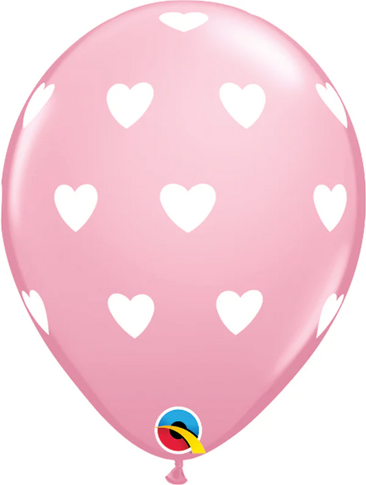 pink balloon with white hearts