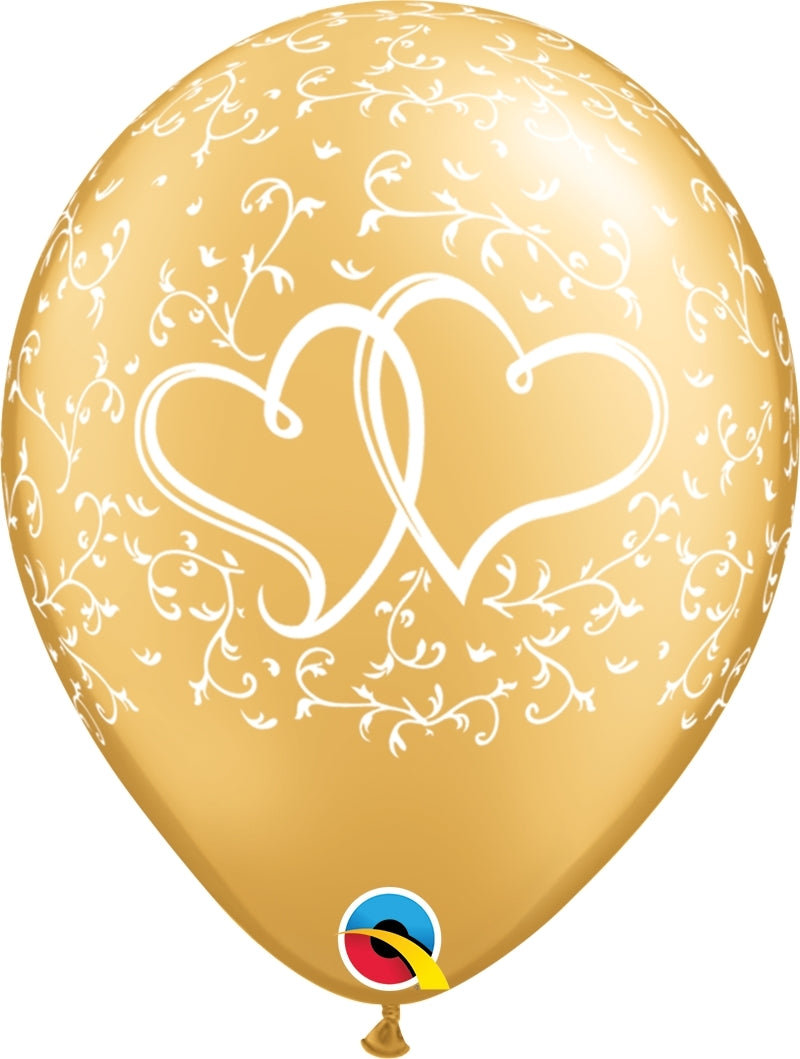gold balloon with white entwined hearts and scrolls